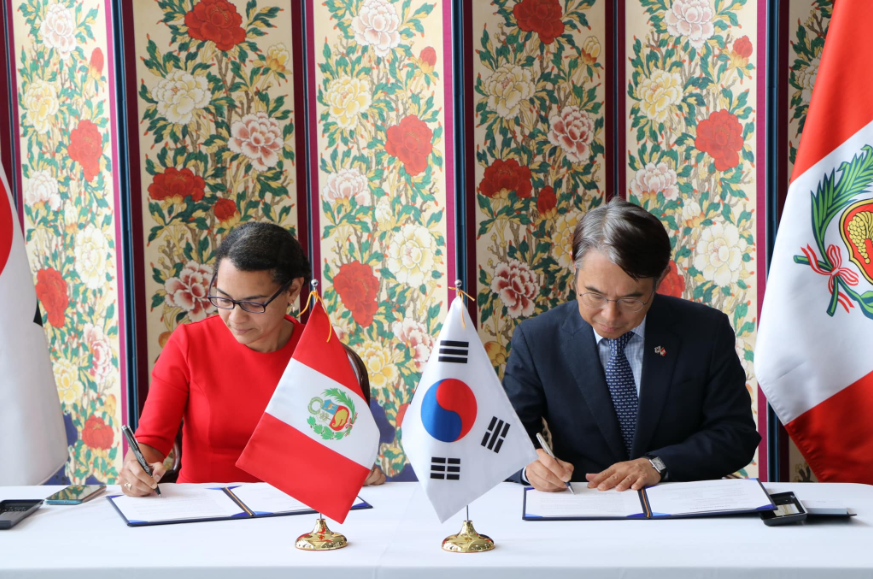 Folding Screen of Peonies and Rocks used as a backdrop at an event (at) the Korean Embassy in Peru